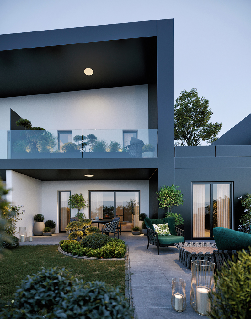 Borgo dei poeti - Vista del giardino con zona relax. Sono visibili anche le ampie finestre del piano terra che permettono di vedere la zona living interna